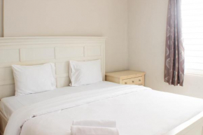 Comfort and Warm 2BR at Marina Ancol Apartment By Travelio